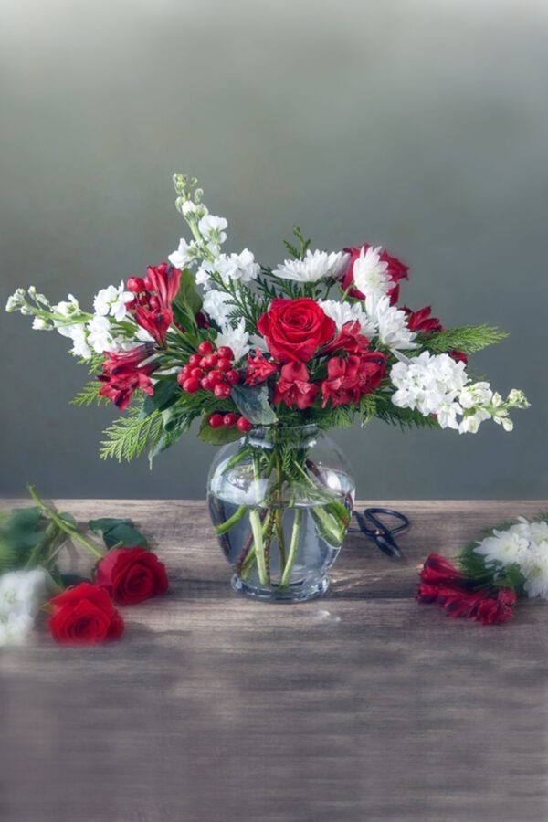 Snowdrop flower bouquet in a vase for delivery